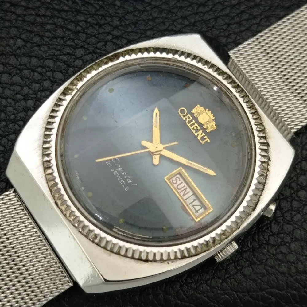 Vintage 1979 Orient Automatic Mens Silver Watch W/daydate & Gold Accents